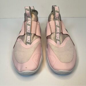 Nike Pink Slip-On Sneakers with‎ Streamlined Design